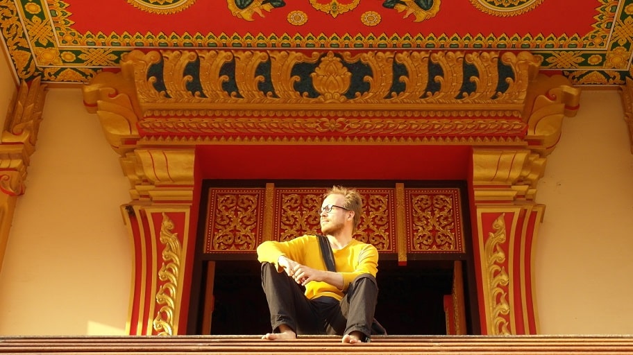 Sitting at the temple in Vientiane, Laos