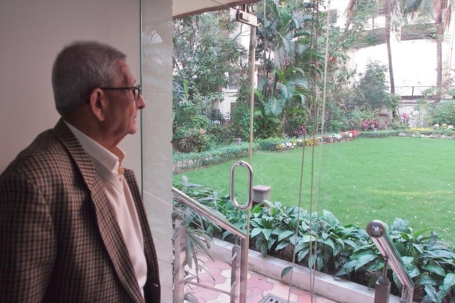 Dr.Prasanta Banerji in his office-watching the garden